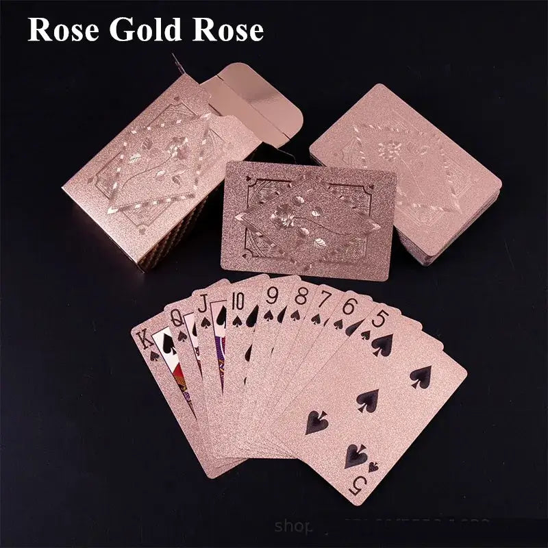 Waterproof rose gold playing card set with stylish design, featuring face cards and decorative box for games.
