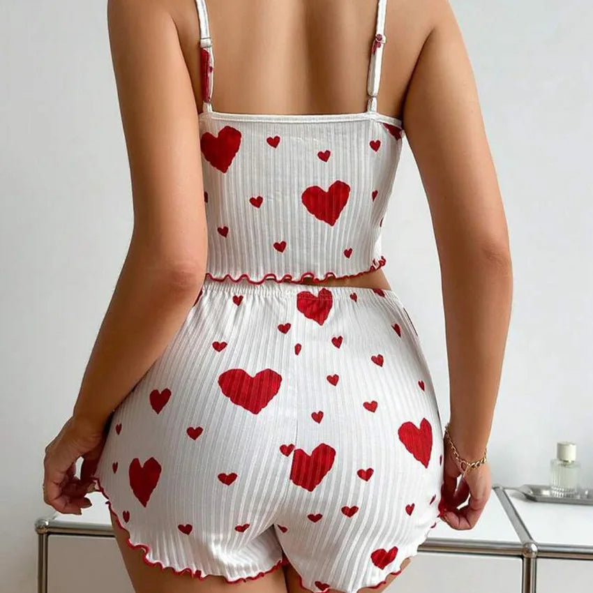 Women's summer pajamas set in red heart print, featuring a tank top and shorts for comfortable sleepwear.