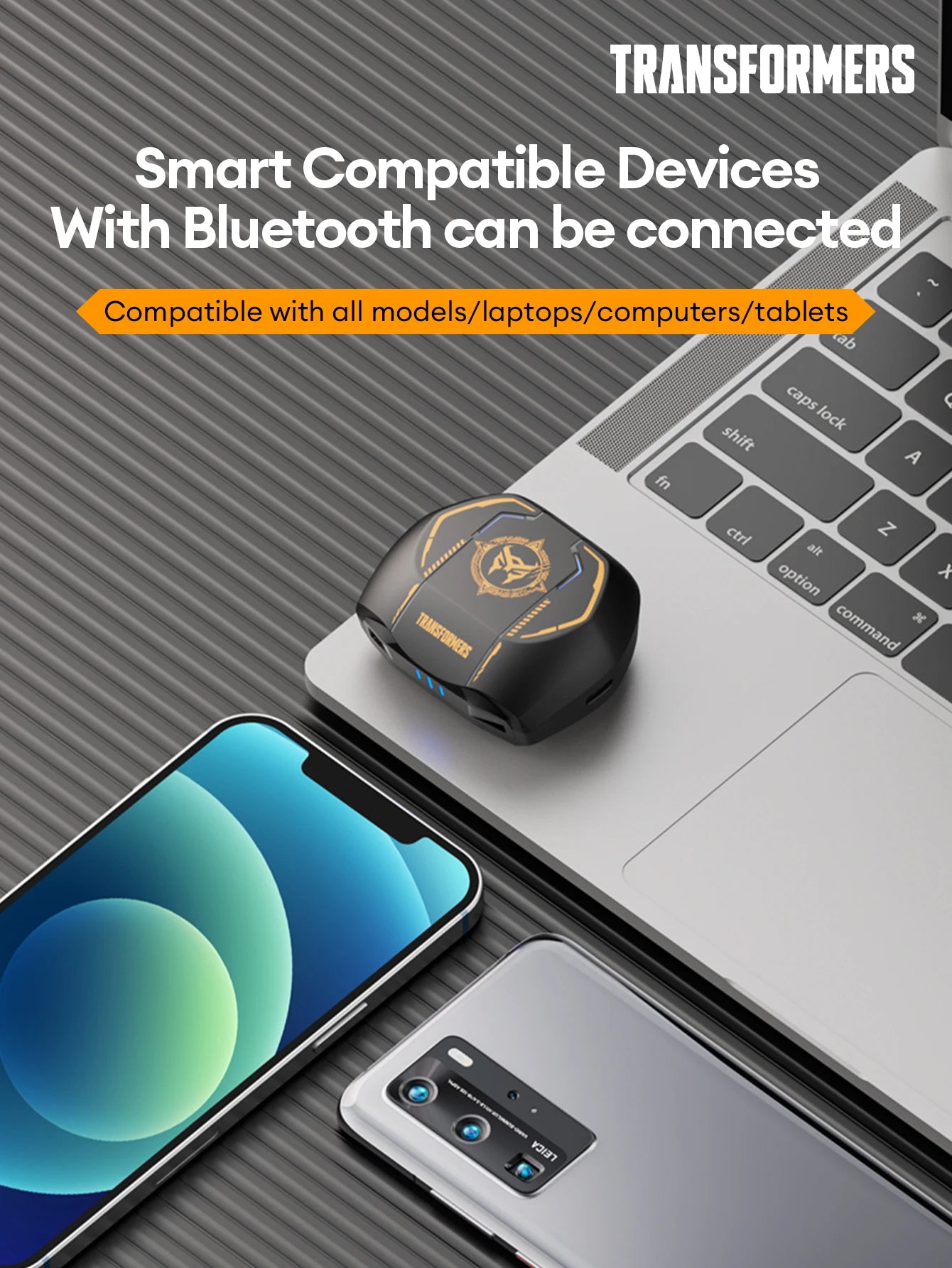 Transformers TF-T06 Bluetooth gaming earbuds on a laptop with smartphone, showcasing compatibility with all devices.